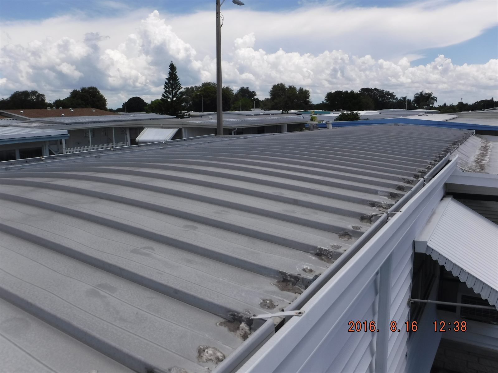 Metal roof covering inspection photo